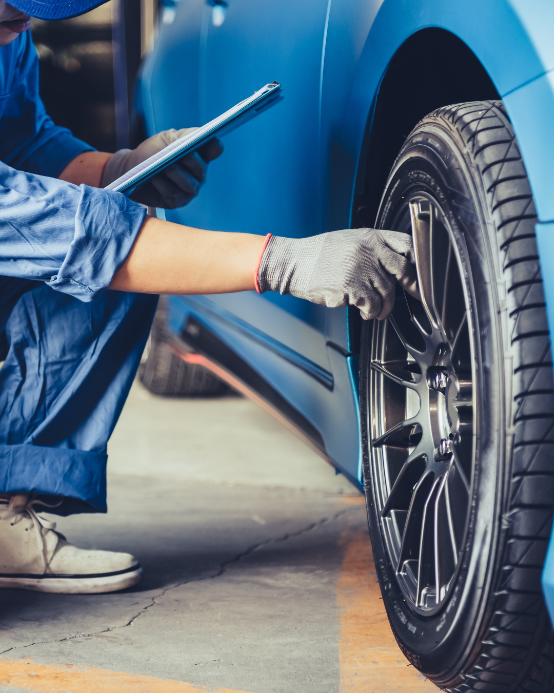 NY mechanic installing winter tires