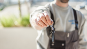 Certified car locksmith assisting a driver in NY/NJ during a lockout.